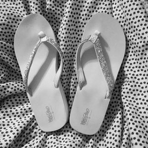Silver sparkly flip flops